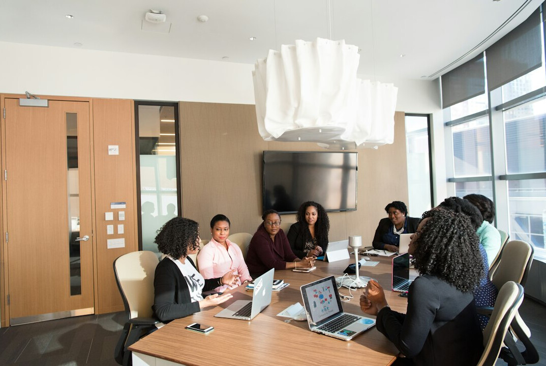 business people negotiating table