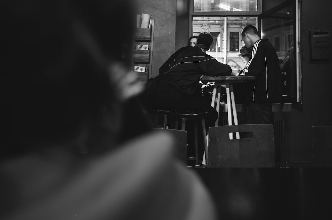 business professionals negotiating at table